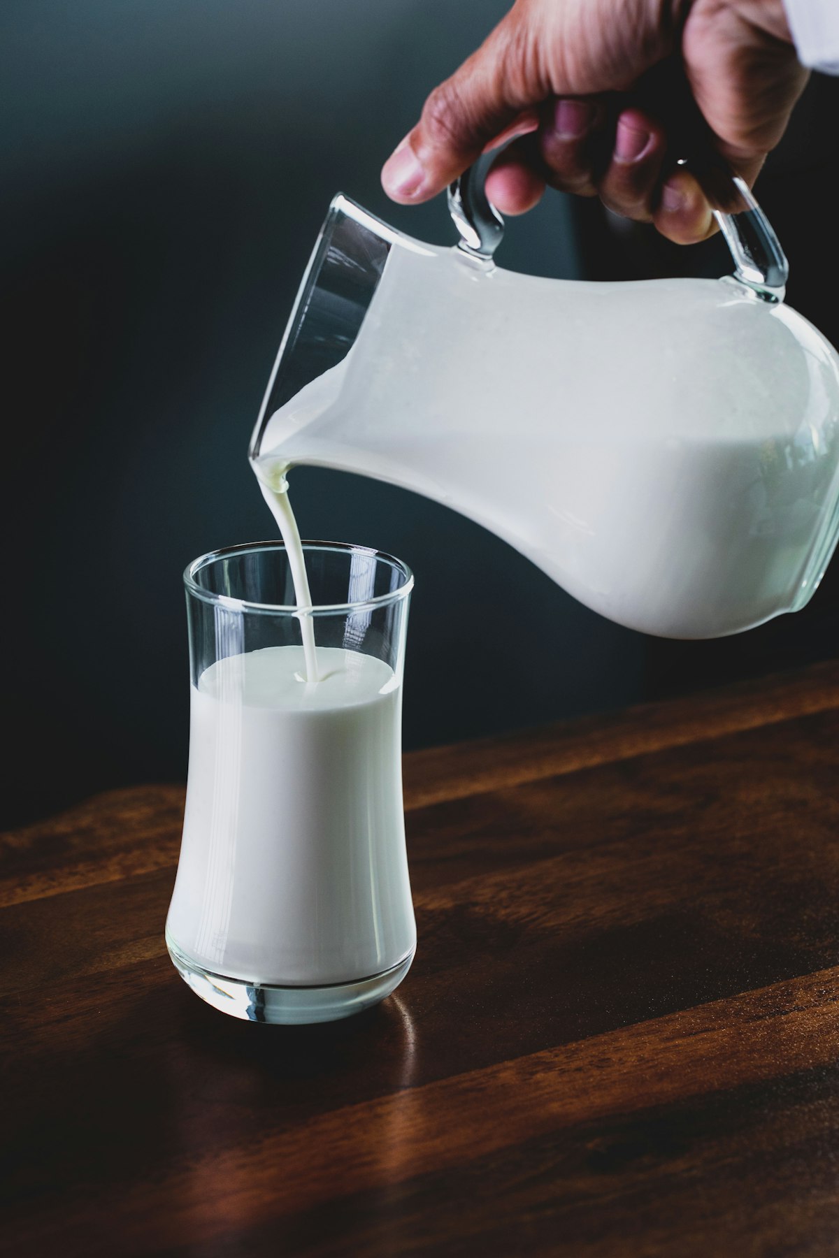 Fresh milk being poured into a glass